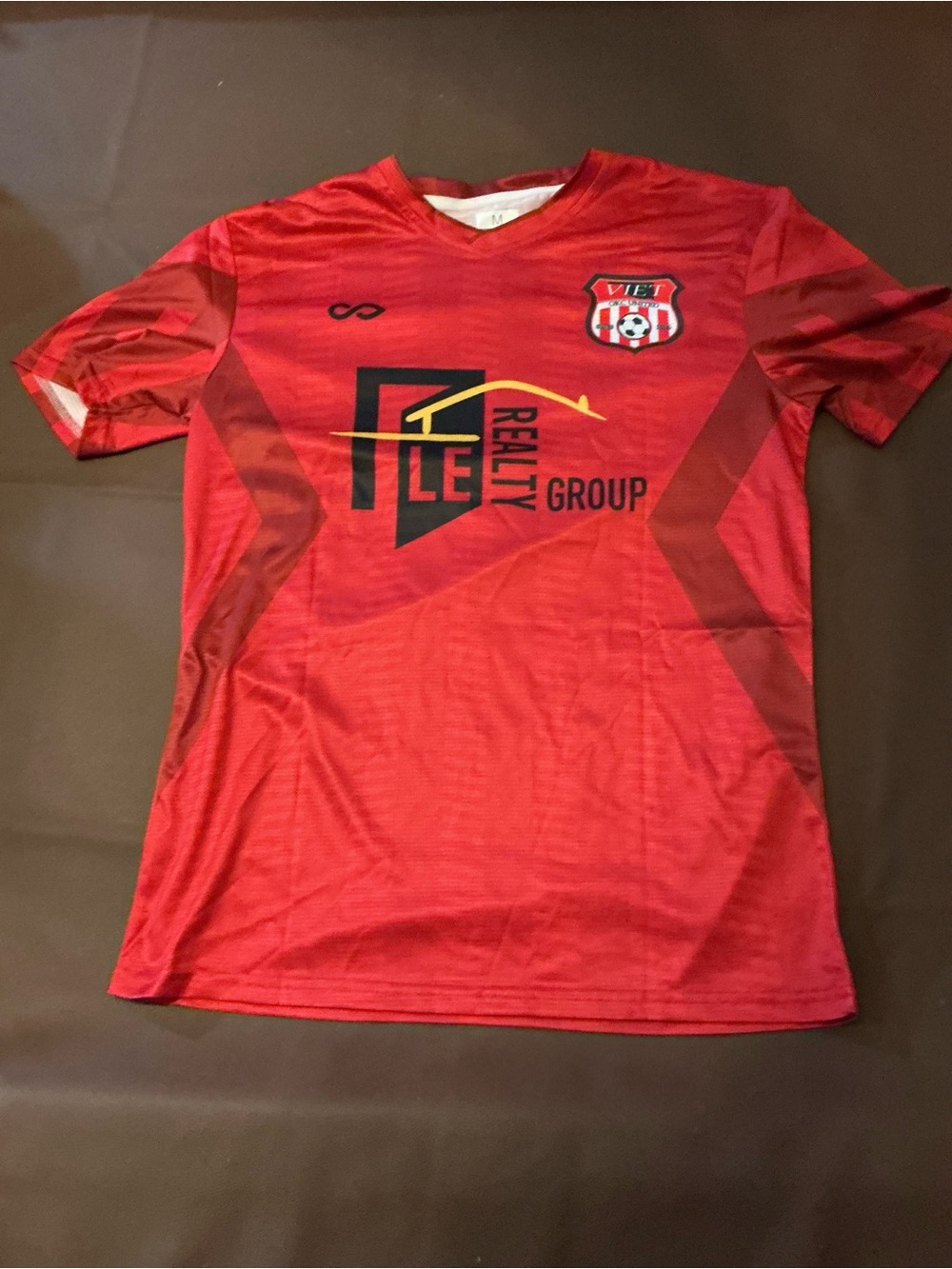 Red Kids Soccer Jersey with Crest and Sponsor Logo
